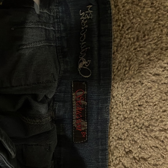 Two pairs of jeans.Both are brand new with no tags.Have cool designs aswell. - Picture 3 of 8